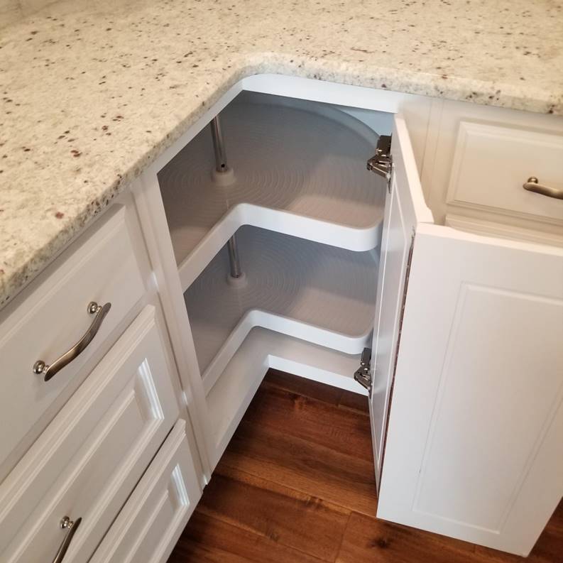 A picture containing indoor, wall, cabinet, floor

Description automatically generated