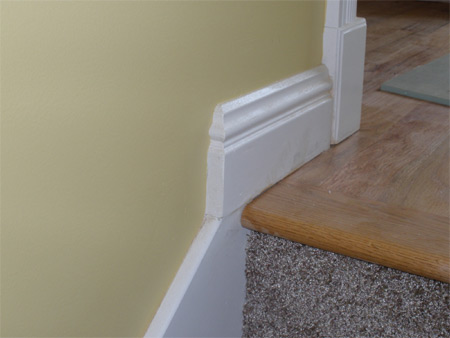 Baseboard with mitered return