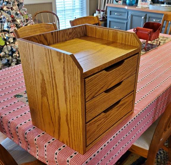 A picture containing indoor, table, chair, wooden

Description automatically generated