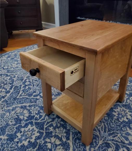 A picture containing floor, table, indoor, furniture

Description automatically generated