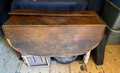 A table with legs and a seat

AI-generated content may be incorrect.