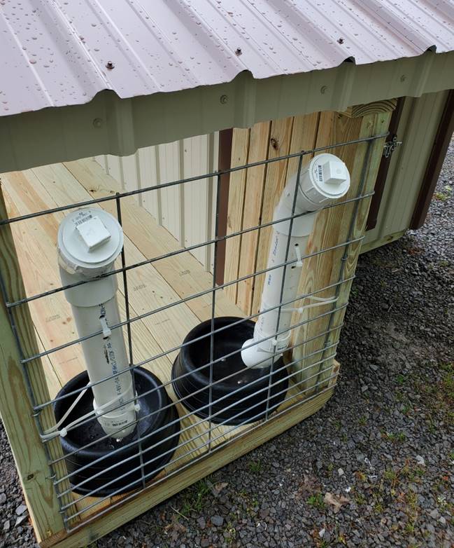 A close up of a cage

Description automatically generated