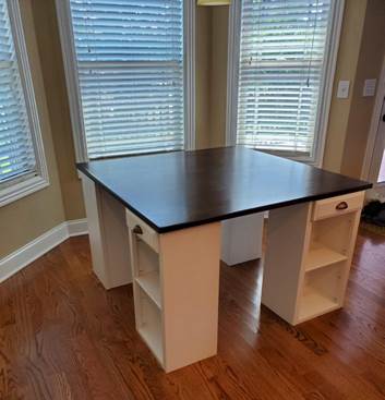 A picture containing building, indoor, wooden, table

Description automatically generated